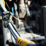 A convenient, cost-effective alternative to zip ties for fastening hydraulic hoses