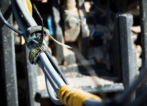 A convenient, cost-effective alternative to zip ties for fastening hydraulic hoses